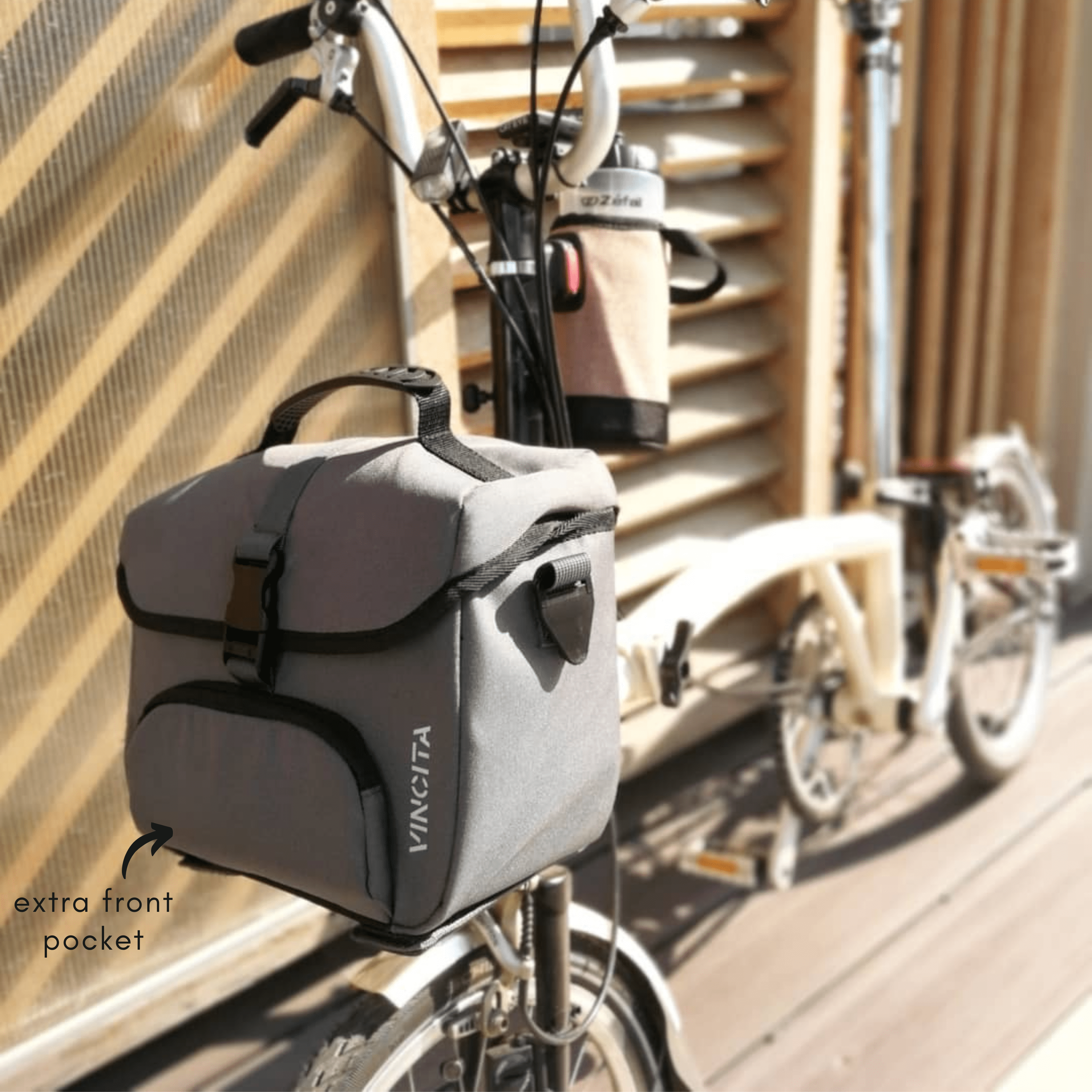 Mini front bag for Brompton, by Vincita Co., Ltd., compact and durable, for carrying essentials, attaches to the front of Brompton bikes, in grey